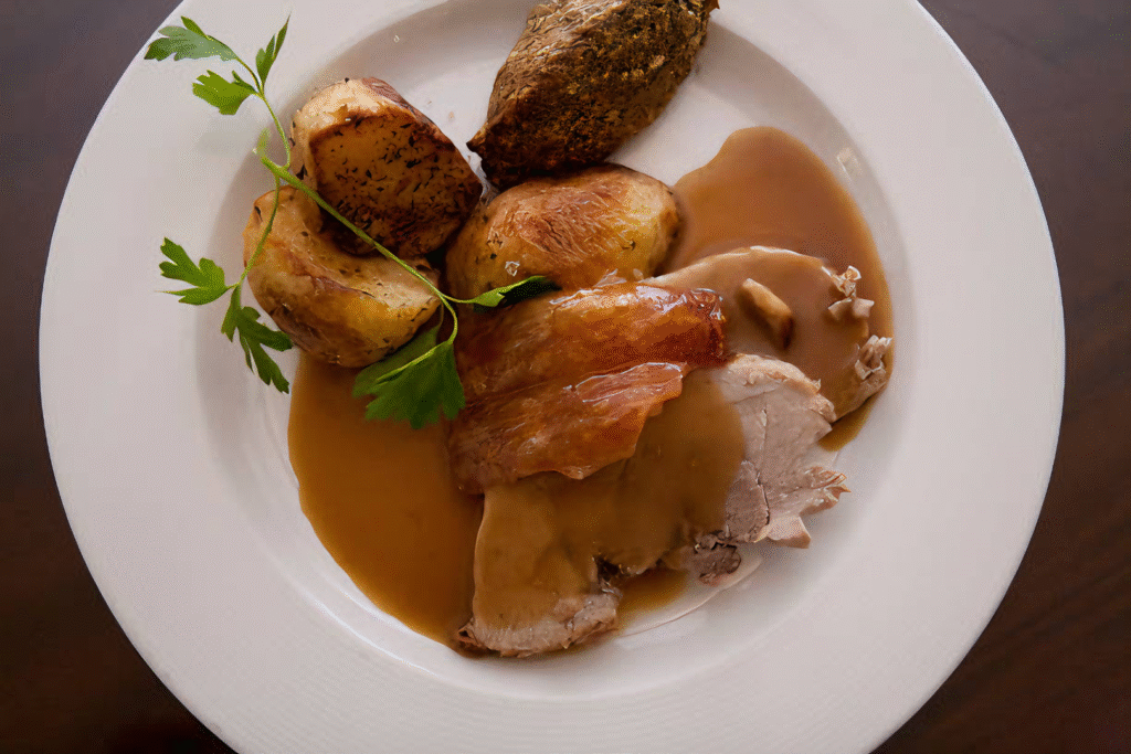 Pernil de Porco ao Molho Madeira
